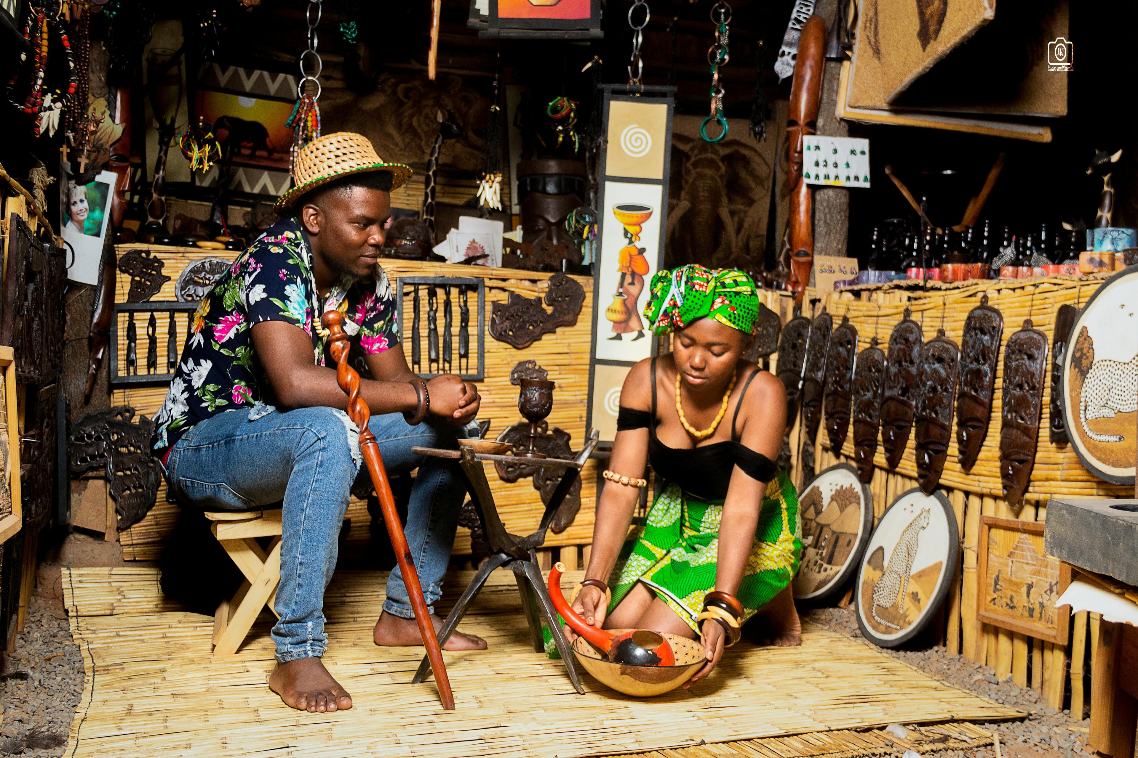 African griot hands with traditional instruments